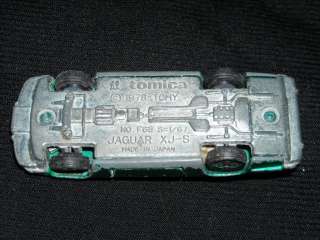   bidding on a vintage tomica die cast vehicle i am not a collector or