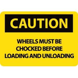  SIGNS WHEELS MUST BE CHOCKED BEFORE LOADING OR