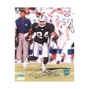 NFL Raiders Charles Woodson # 24. Autographed Plaque 