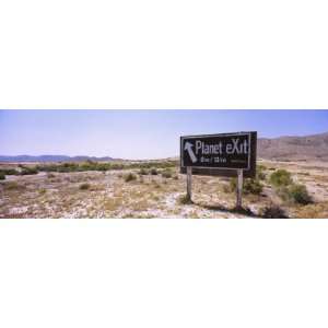  Road Sign in a Desert, Planet Exit, Nevada, USA Stretched 