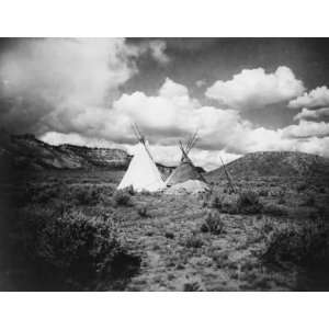   Apache Indian teepees in a hilly landscape in Arizona