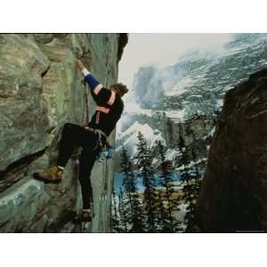  A Climber Ascends the Quartzite Cliffs at the End of Lake 