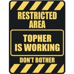   RESTRICTED AREA TOPHER IS WORKING  PARKING SIGN