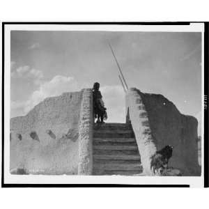  Tewa Indian guard at top of the kiva stairs,San Ildefonso 