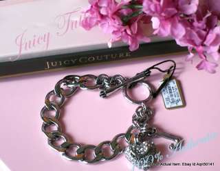   . Toggle clasp with signature crown embellishments. 8L. Imported