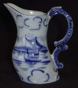 Antique Germany Relief Molded Flow Blue Delft Porcelain Pitcher w 