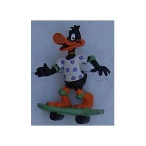  Daffy Duck PVC On Skateboard 2 1/2 Tall 1990`s 
