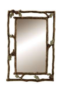 This rustic lodge style mirror has a brass and aluminum frame which is 
