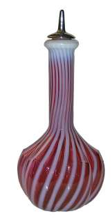   via  a truly stunning piece of the swirl pattern in the cranberry