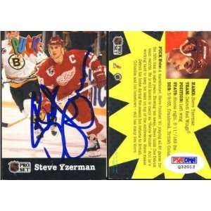 Autographed Steve Yzerman Puck   1992 Pro Set Insert Card # 8 PSA COA 