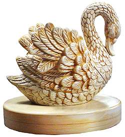 This fountain features an elegant swan that has a 3 tier system for 