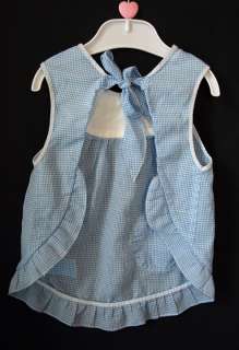   apron ties in back funny bunny pocket on front ruffled hem this can be