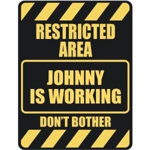   RESTRICTED AREA JOHNNY IS WORKING  PARKING SIGN
