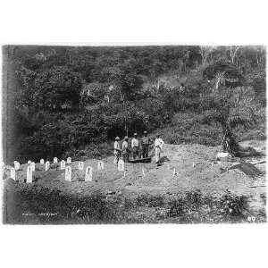  Ancon Cemetery,Men standing among graves,Ancon,Panama 