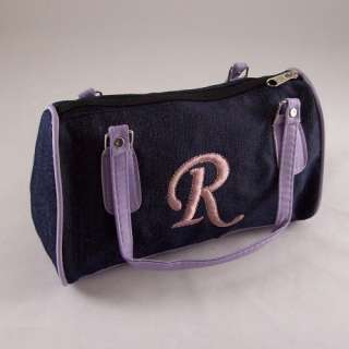 letter boston purse are made of fabric zip closures on the top silver 