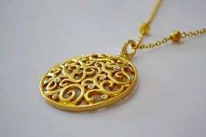 Carolee Cutout Circle Round Pendant Gold Tone Necklace  