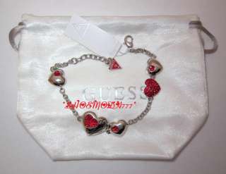 New with tag and GUESS pouch