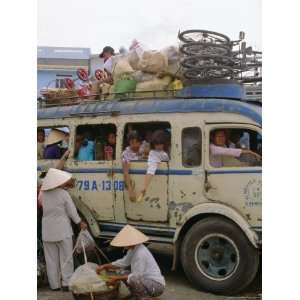  Bus with Bicycles, Sacks and Passengers on Roof, City Bus Terminal 