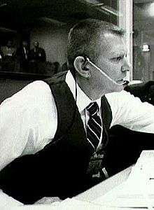 Gene Kranz, uncharacteristically wearing a dark vest (probably during 